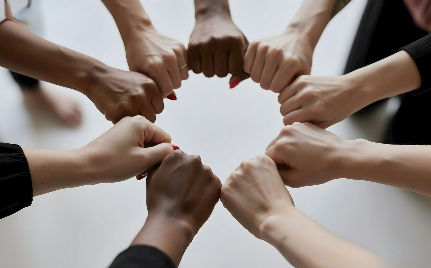 Hands joined together in support